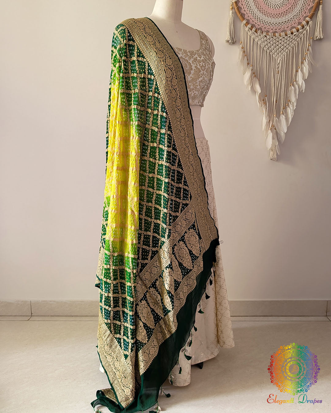 Side view of green shaded Banarasi georgette Gharchola Bandhani dupatta showcasing elegant ombré shading, Gharchola checks, and Bandhani motifs