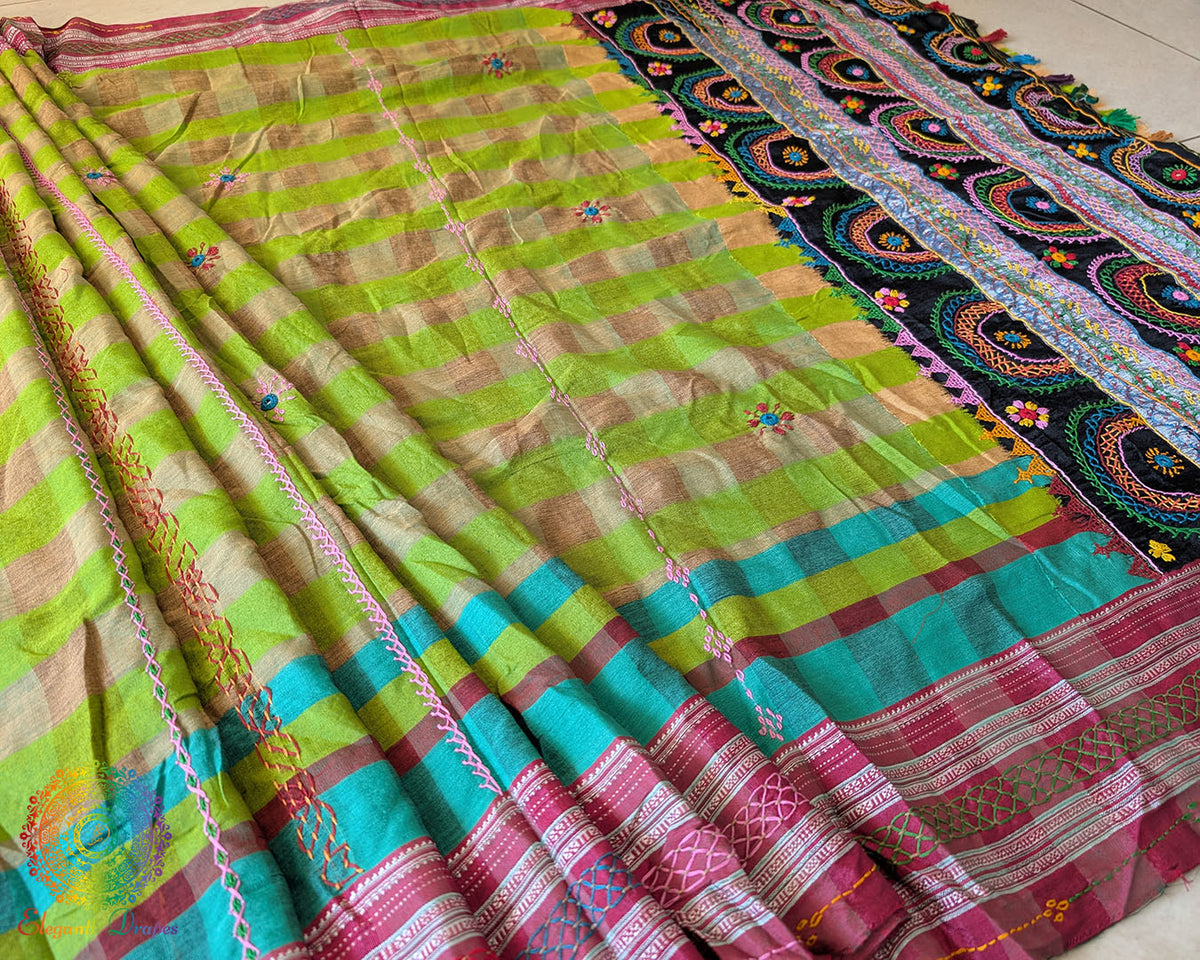 Parrot green checked Ilkal cotton saree highlighting decorative Lambani embroidered bels