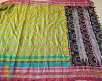 Parrot green checked Ilkal cotton saree with Lambani handwork and heavily embroidered palla