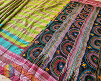 Parrot green checked Ilkal cotton saree showcasing approximately half-meter heavy Lambani embroidered palla
