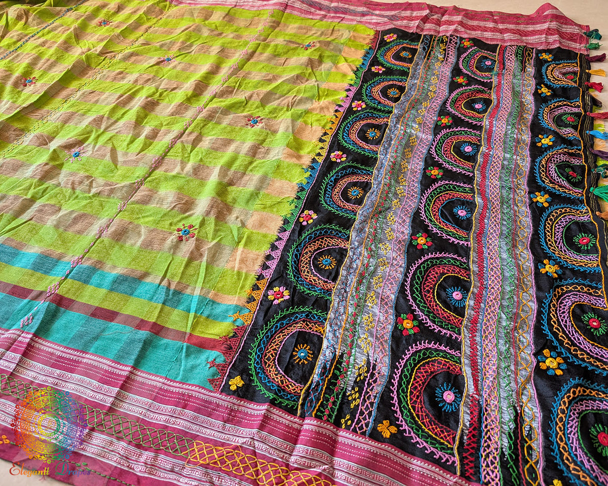 Full drape of parrot green checked Ilkal cotton saree showcasing Lambani hand embroidery