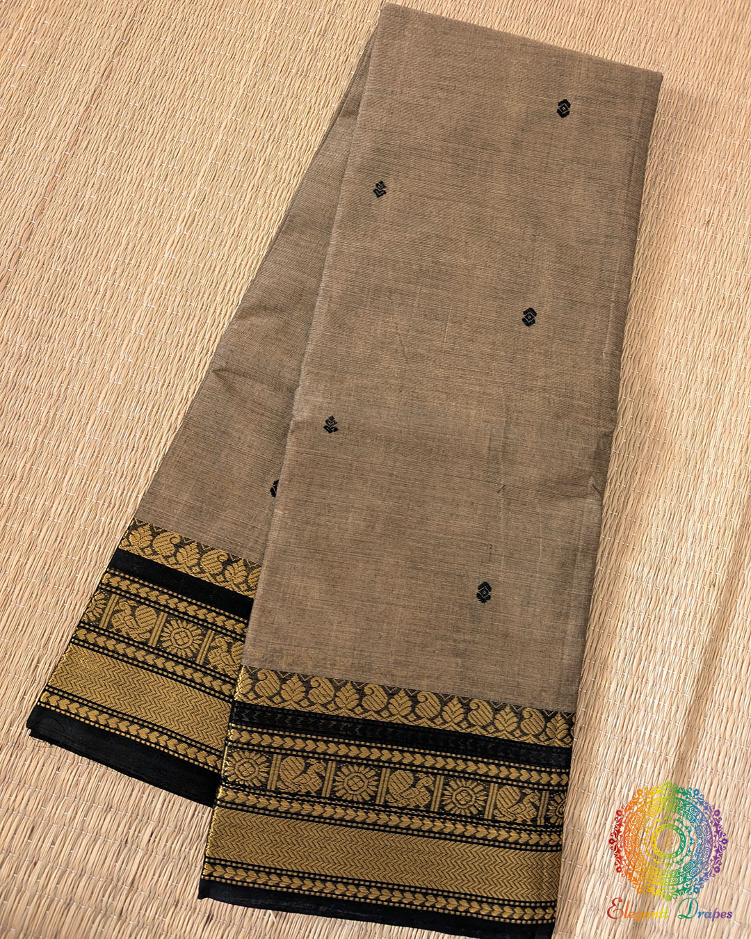 Grey Kanchi cotton saree folded view showing neutral tone and texture