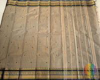 Full grey Kanchi cotton saree laid flat showing complete design and drape