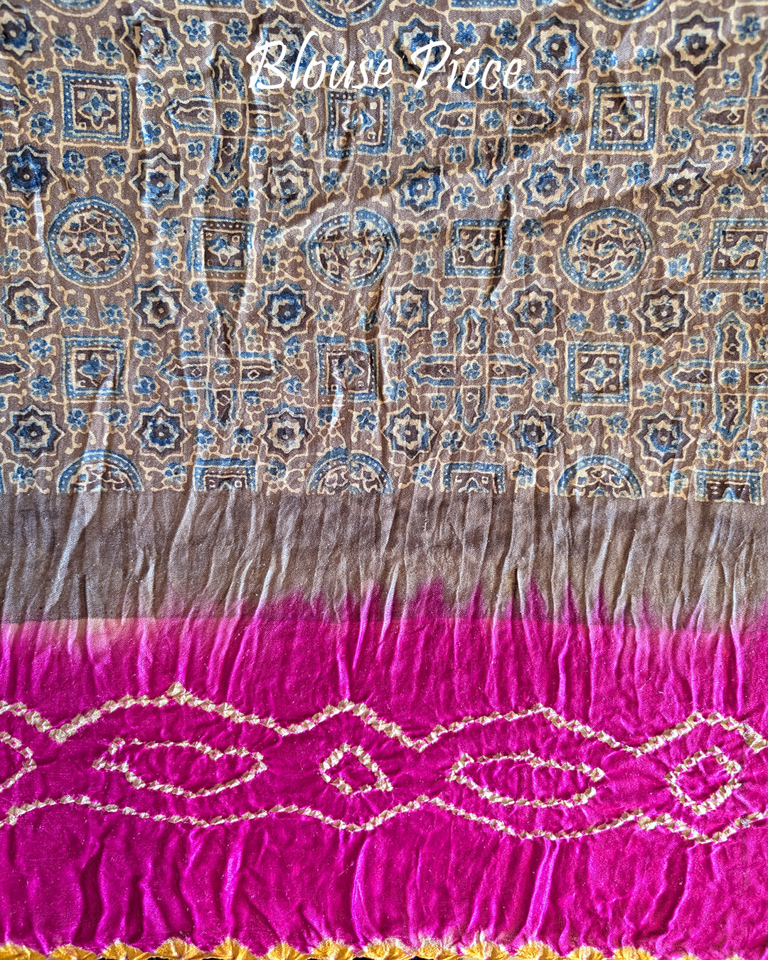 Matching blouse piece in grey Ajrakh fabric with magenta bandhani detailing