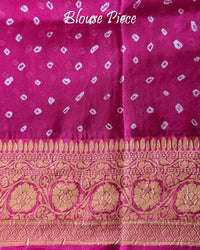 Matching blouse piece in grey pink Banarasi khaddi georgette fabric showing weave detail
