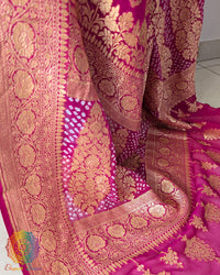 Detailed view of pink border and bandhani work on Banarasi saree