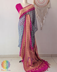 Grey pink Banarasi khaddi georgette bandhani saree on mannequin showing full drape