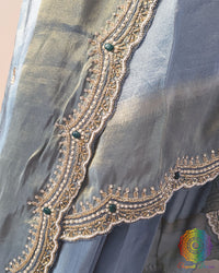 Grey soft tissue silk cutdana handwork saree border detail