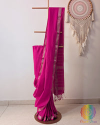 Hot pink Bengal cotton saree with zari border on mannequin showing full drape