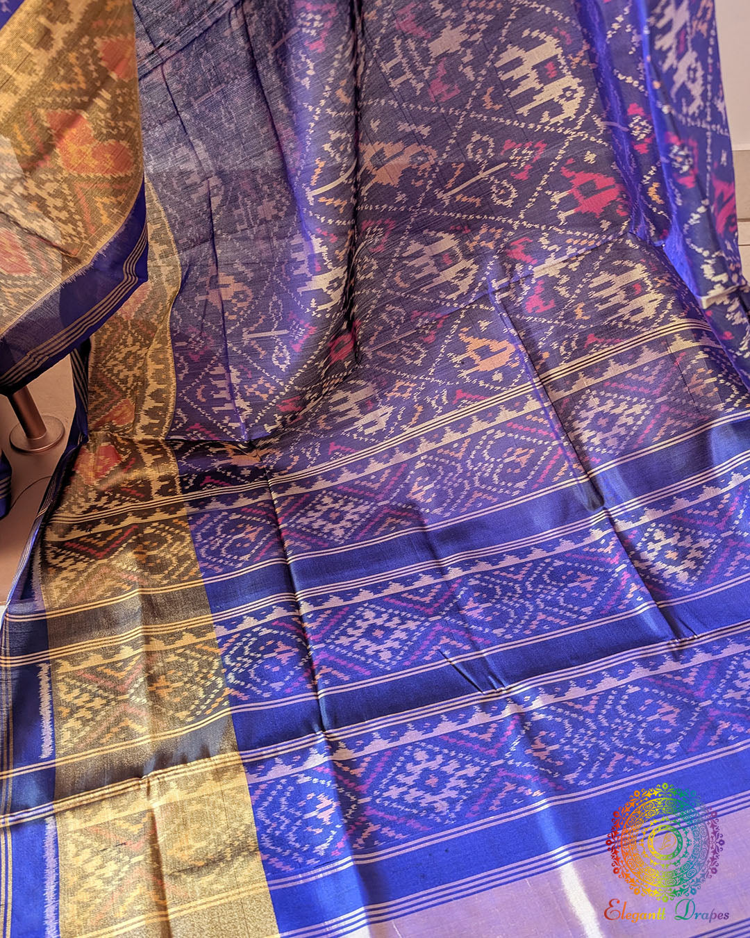 Indigo Blue Rajkot Patola Silk Saree – Palla Close-Up highlighting the intricate geometric motifs and traditional patterns woven across the palla, showcasing the detailed craftsmanship and rich texture of the indigo blue mulberry silk.
