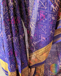 Indigo Blue Handwoven Rajkot Patola Saree – Mulberry Silk Weave Detail highlighting the fine handwoven silk texture and intricate weaving patterns that reflect the traditional craftsmanship associated with Rajkot Patola textiles.