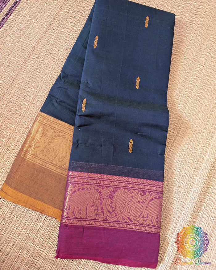 Ink blue Kanchi cotton saree folded view with traditional Ganga Jamuna border