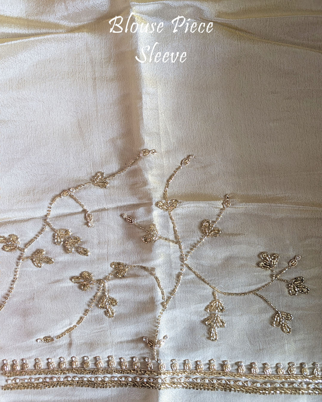 Matching blouse piece with coordinated Cutdana, pearl, and zardozi hand embroidery