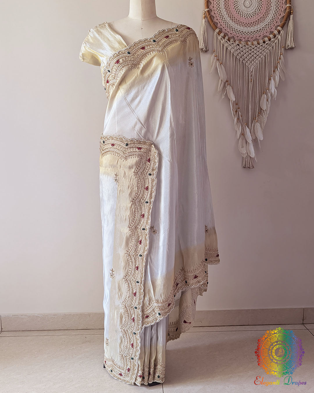 Full drape of Ivory Soft Tissue Silk saree showcasing elegant handcrafted border and natural sheen