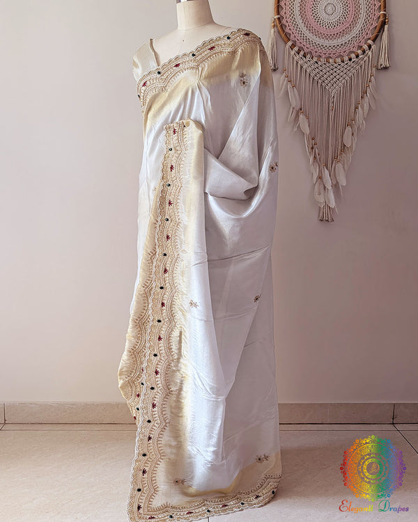 Side view of Ivory Soft Tissue Silk saree highlighting the self-woven wave pattern and delicate floral butis