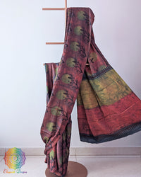 Lavender Nashpal Pomegranate Ajrakh Modal Tussar Silk Saree with the palla neatly pleated, highlighting the layered design and traditional pomegranate Ajrakh detailing.