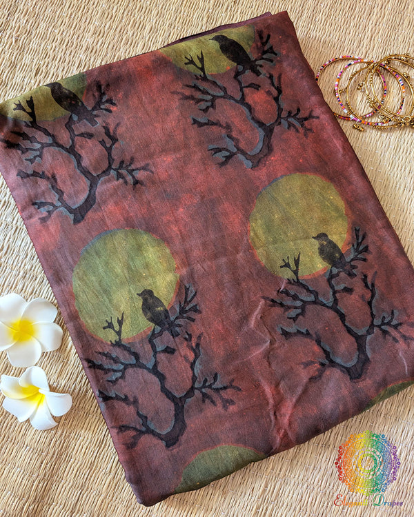 Lavender Nashpal Pomegranate Ajrakh Modal Tussar Silk Saree folded to display its delicate lavender shade, Nashpal Pomegranate Ajrakh print and striped textile design.