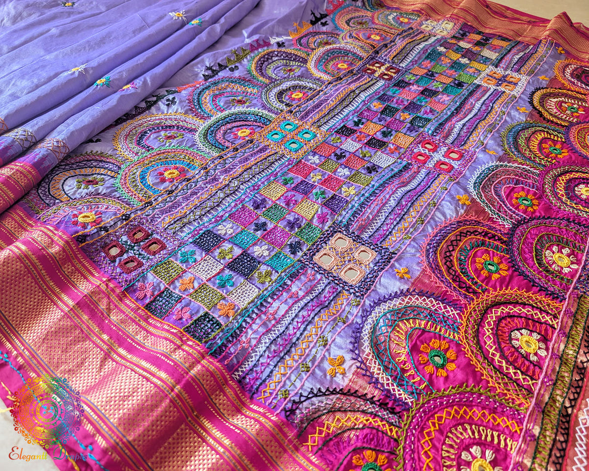 Detailed view of handcrafted embroidery on pink palla of Ilkal silk saree