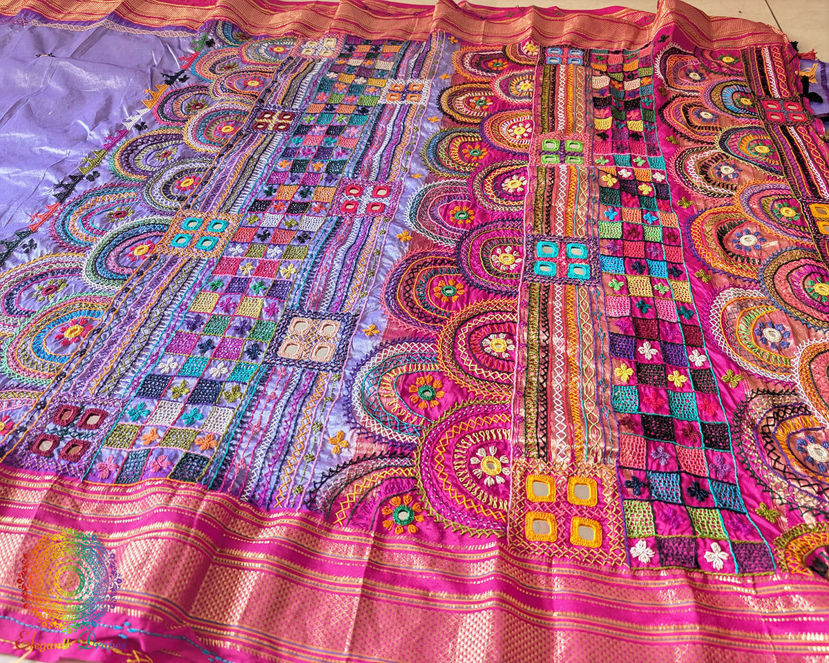 Intricate Lambani hand embroidery detail on lavender silk saree