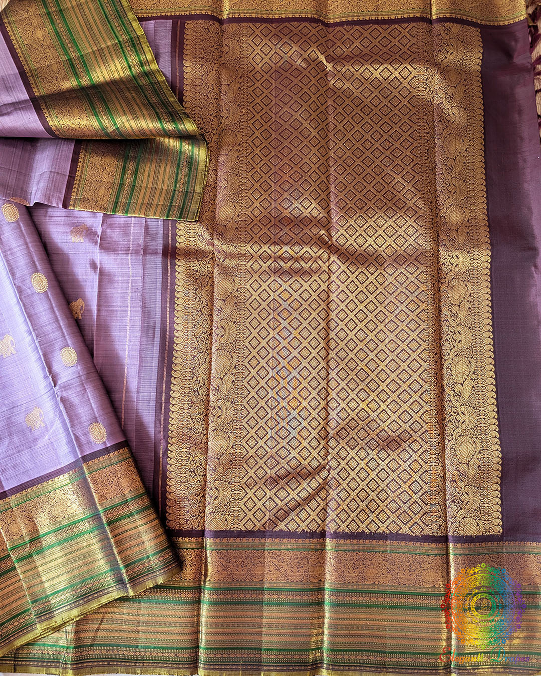 Lavender Pure Kanjivaram Silk Saree with wide green and gold zari border