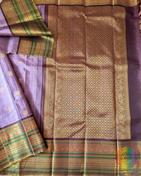 Lavender Pure Kanjivaram Silk Saree with wide green and gold zari border