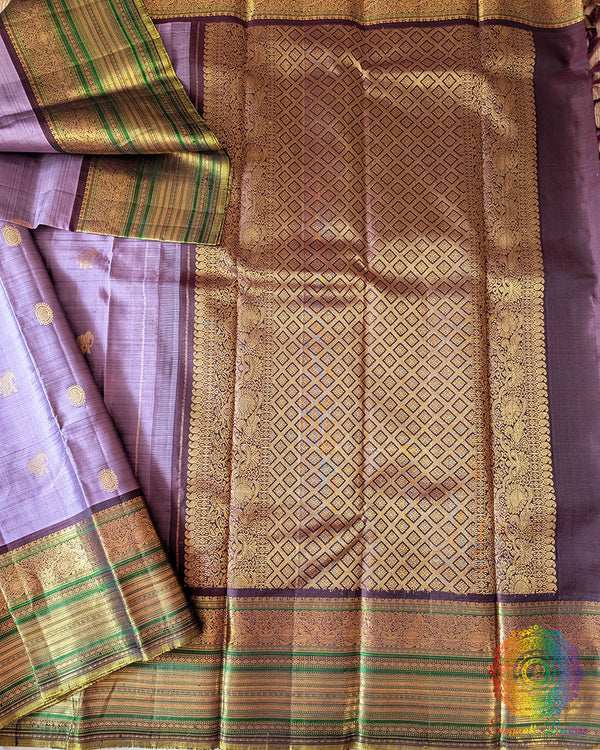 Lavender Pure Kanjivaram Silk Saree with wide green and gold zari border