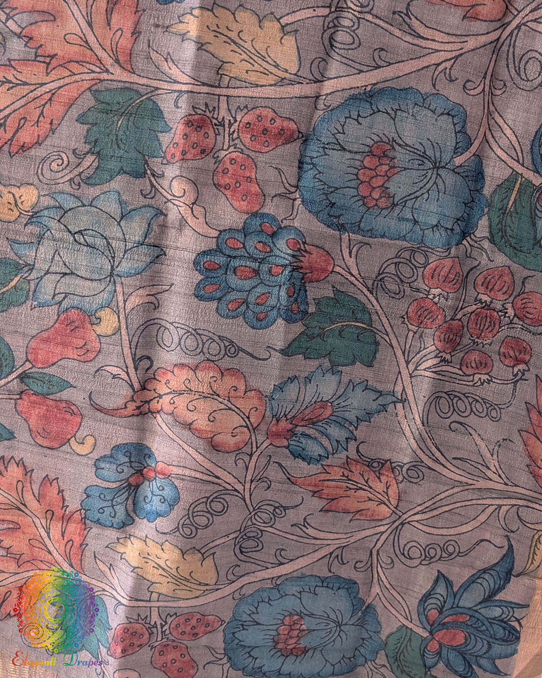 Close-up of authentic hand-painted Kalamkari artwork highlighting the rich texture and natural sheen of Muted Grey Pure Tussar Silk dupatta