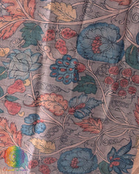 Close-up of authentic hand-painted Kalamkari artwork highlighting the rich texture and natural sheen of Muted Grey Pure Tussar Silk dupatta