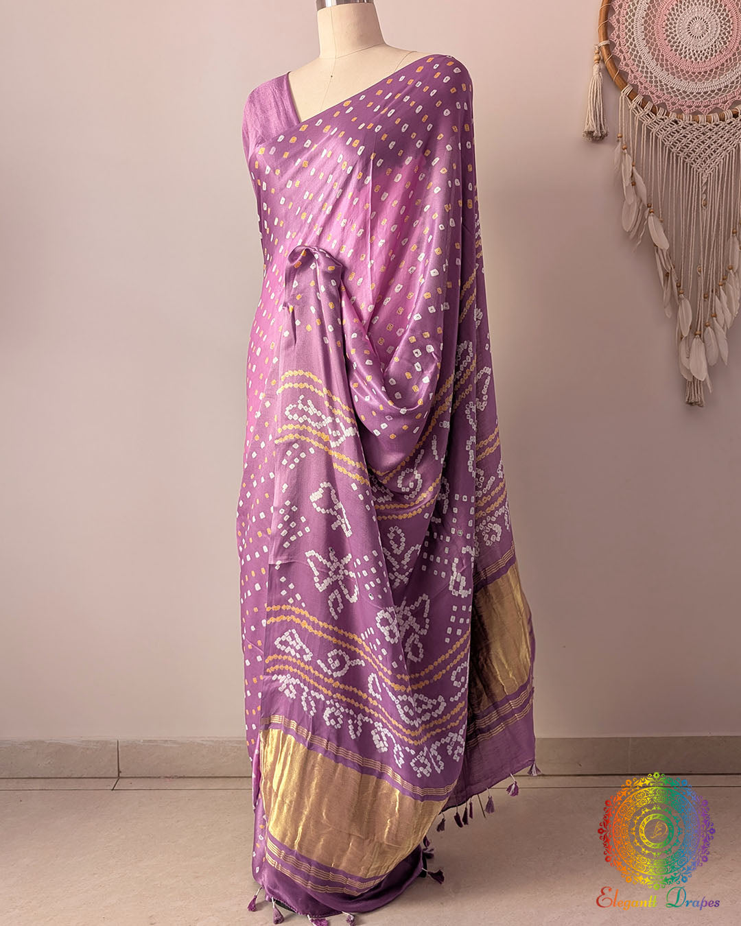 Pastel Lavender gaji silk saree showcasing elegant drape with traditional Bandhani dot pattern