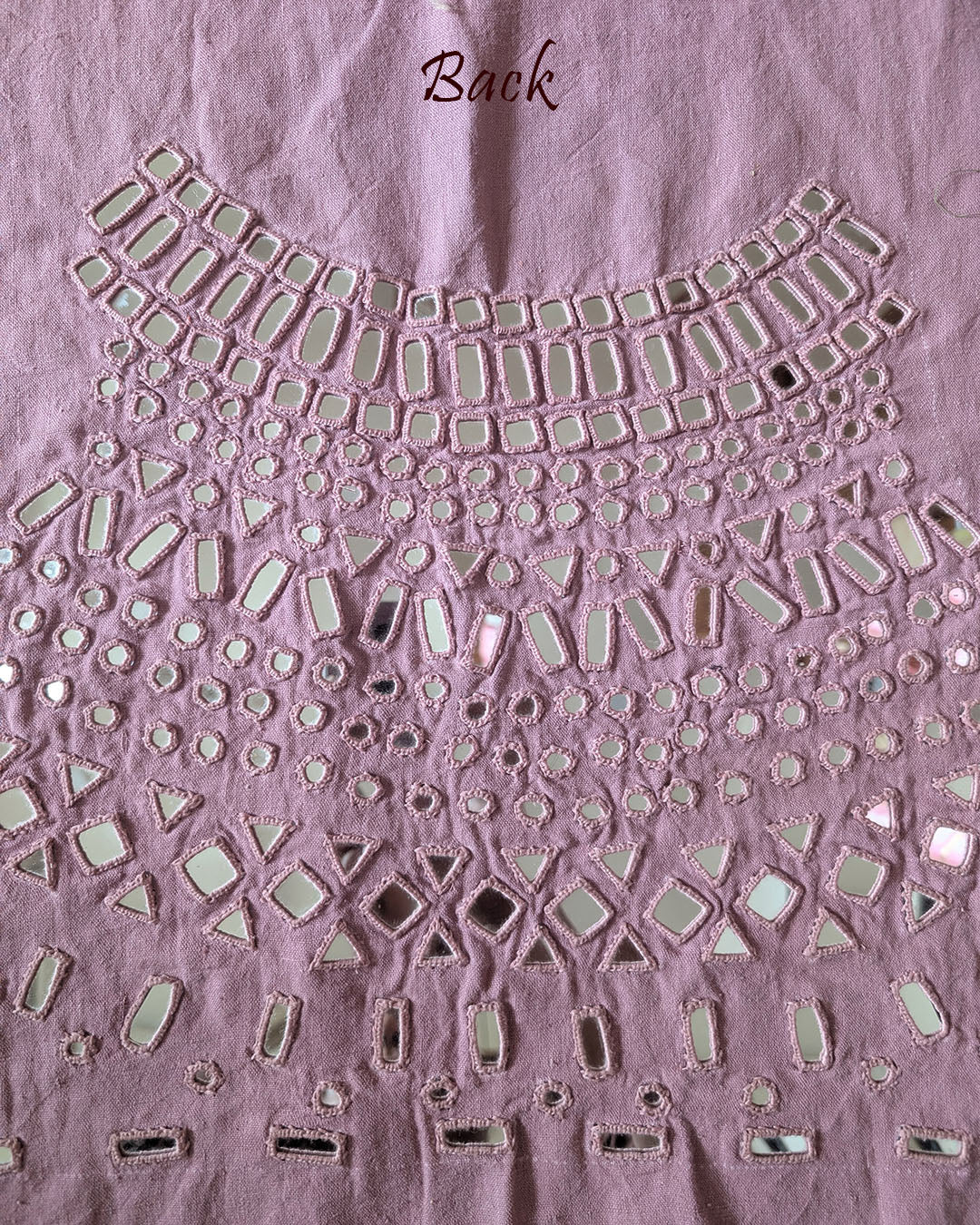 Back view of the Lilac Kala Cotton Kutch Mirror Handwork blouse piece, showcasing intricate Kutch embroidery and real mirrors arranged in a decorative handcrafted design.