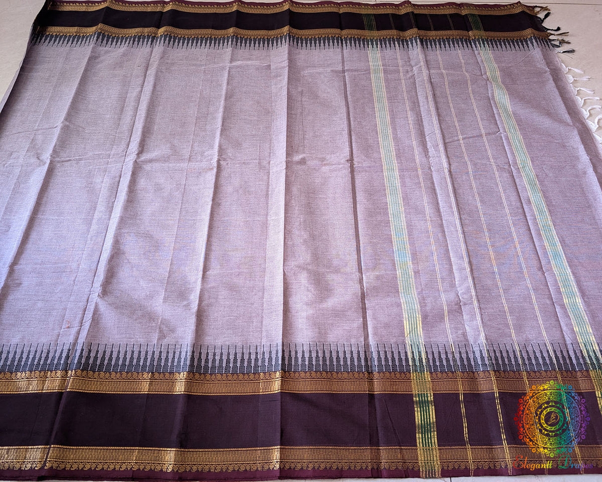 Full lilac pink Kanchi cotton saree laid open showcasing overall design and drape