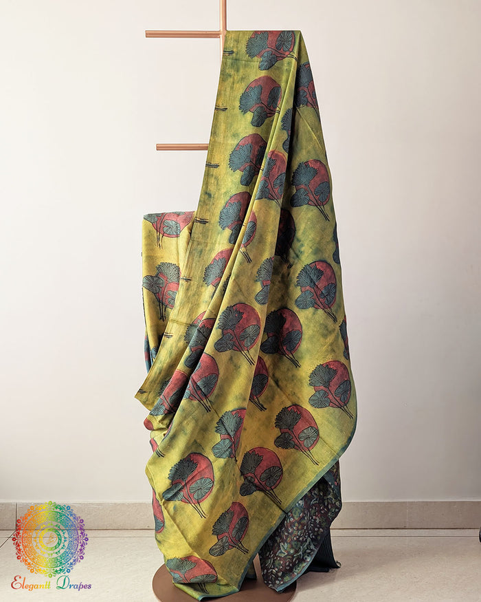 Lime Green Nashpal Pomegranate Ajrakh Modal Tussar Saree with the palla fully opened, showcasing its vibrant lime green colour and traditional floral Ajrakh design.