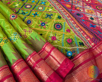 Detailed view of the red border of the Lime Green Pure Ilkal Silk Saree, showcasing the contrasting red and lime green colours with traditional textile detailing.