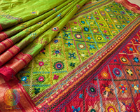 Detailed view of the lime green body of the Pure Ilkal Silk Saree, highlighting the rich colour and traditional Ilkal silk texture.
