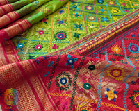 Lime Green Pure Ilkal Silk Saree with a detailed view of the red palla, featuring colourful Sindur Lambani hand embroidery and traditional handcrafted patterns.