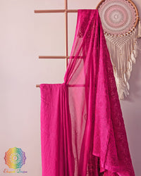 Close up of Chikankari-inspired thread embroidery on magenta pink Bengal cotton saree