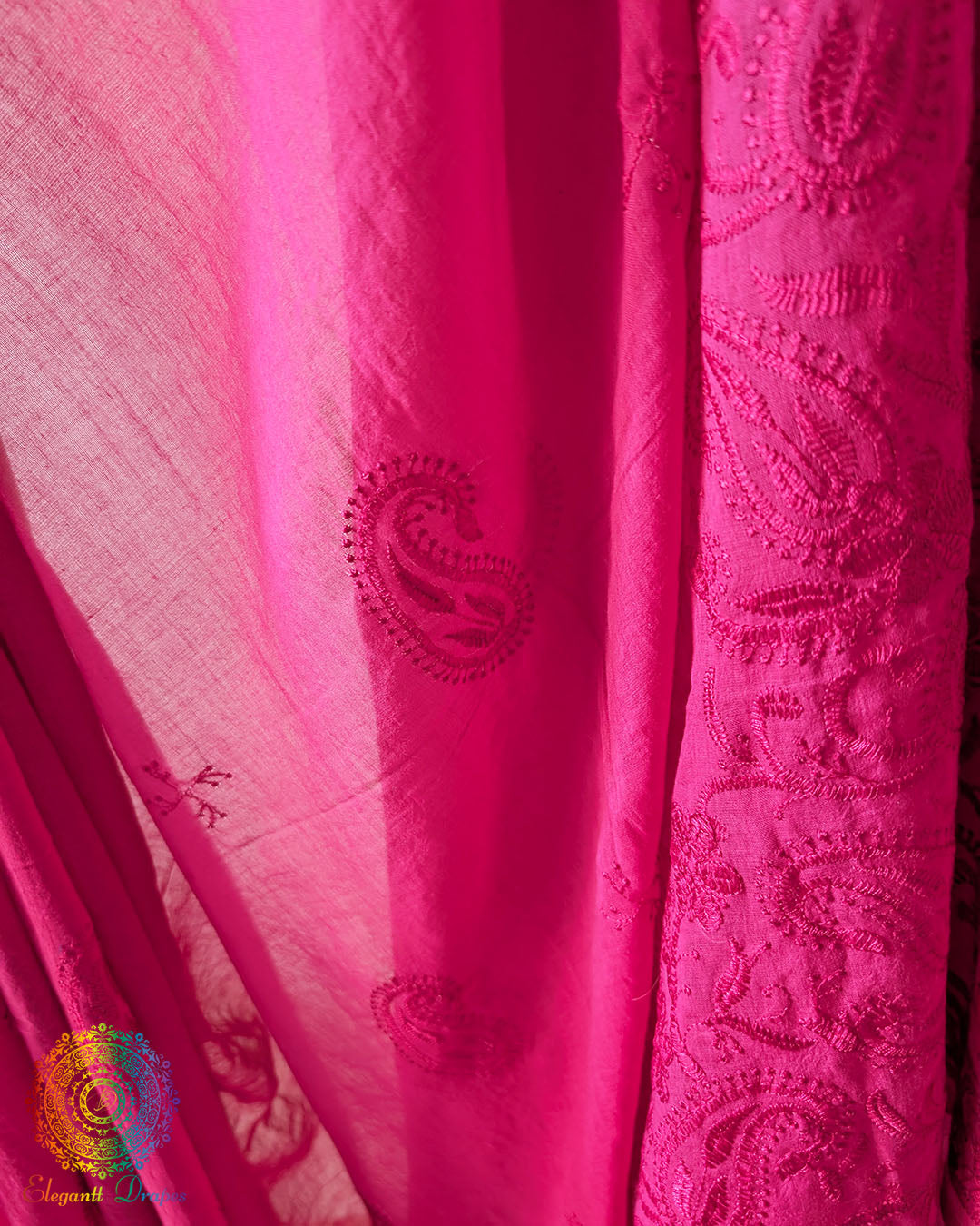 Magenta pink Bengal cotton fabric close up showing weave and embroidery-inspired detailing