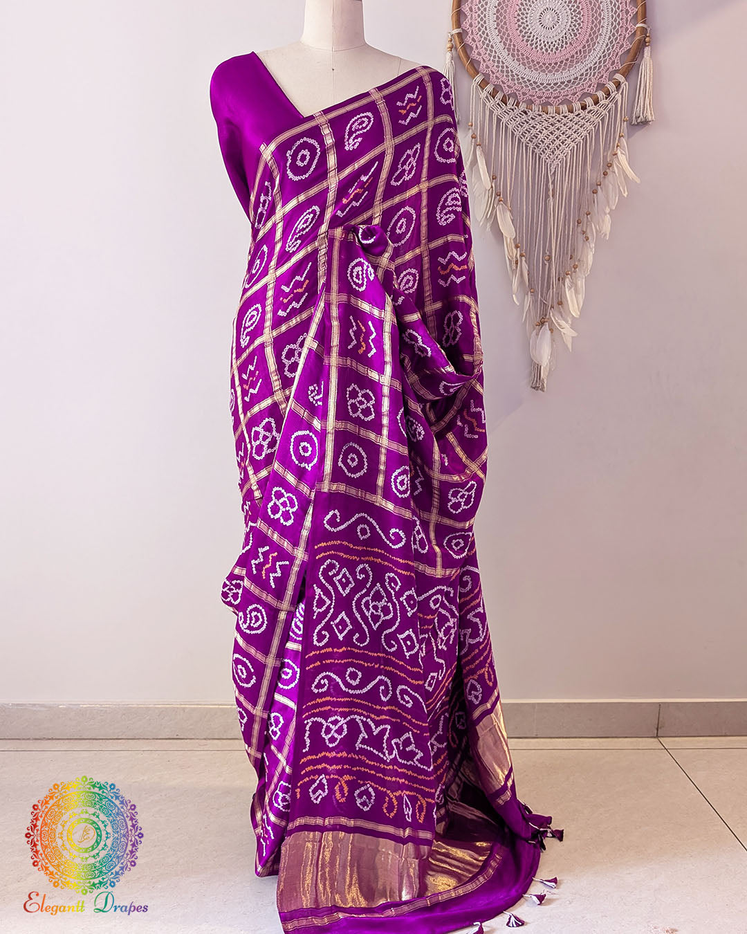 Berry purple Gharchola pure gaji silk Bandhani saree on mannequin with zari checks and Bandhani motifs