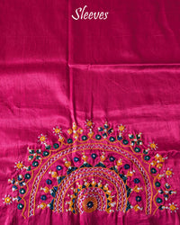 Sleeve embroidery detail on rani pink Bavadiya handwork blouse fabric