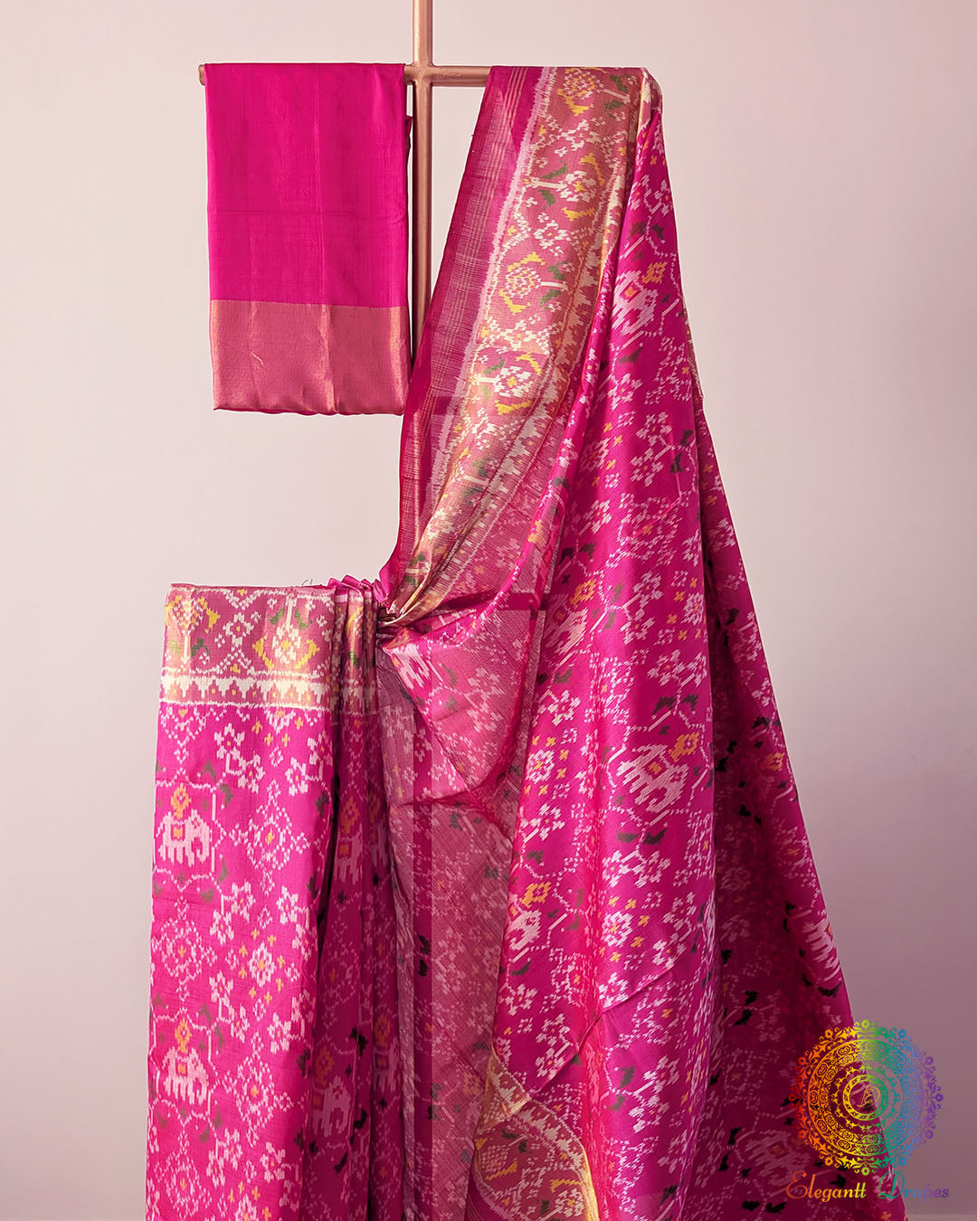 Magenta Pink Handwoven Mulberry Silk Patola Saree – Body Pattern Close-Up showcasing the detailed motifs across the saree body, highlighting the traditional Rajkot Patola design and the vibrant magenta pink silk base.