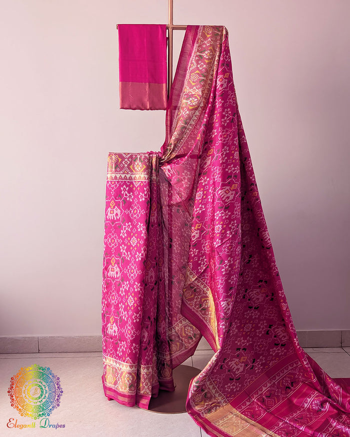 Magenta Pink Handwoven Mulberry Silk Rajkot Patola Saree – Full Drape View showcasing the vibrant magenta pink colour, traditional Rajkot Patola patterns and graceful drape of the handwoven mulberry silk saree, highlighting its rich colour and elegant ethnic appeal.