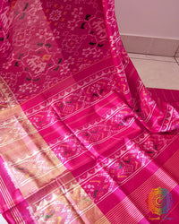 Magenta Pink Rajkot Patola Silk Saree – Palla Close-Up highlighting the intricate traditional motifs and geometric patterns woven across the palla, showcasing the detailed craftsmanship and rich texture of the magenta pink mulberry silk.