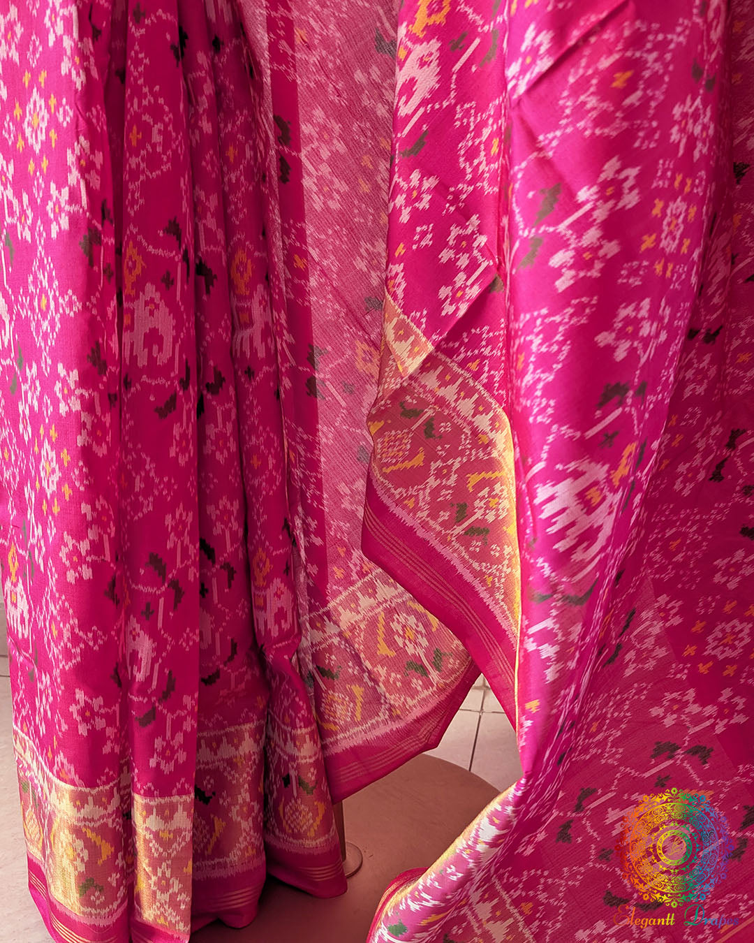Magenta Pink Handwoven Rajkot Patola Saree – Mulberry Silk Weave Detail highlighting the fine handwoven silk texture and intricate weaving patterns that reflect the traditional craftsmanship associated with Rajkot Patola textiles.