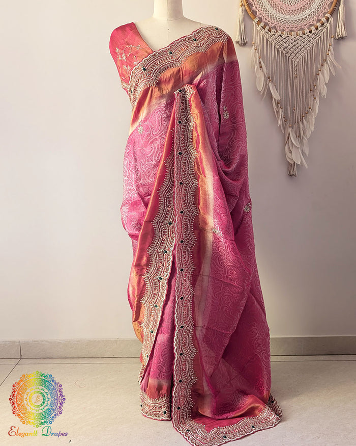 Magenta Pink Soft Tissue Silk saree with self-woven wave pattern and Cutdana, pearl, and zardozi handwork