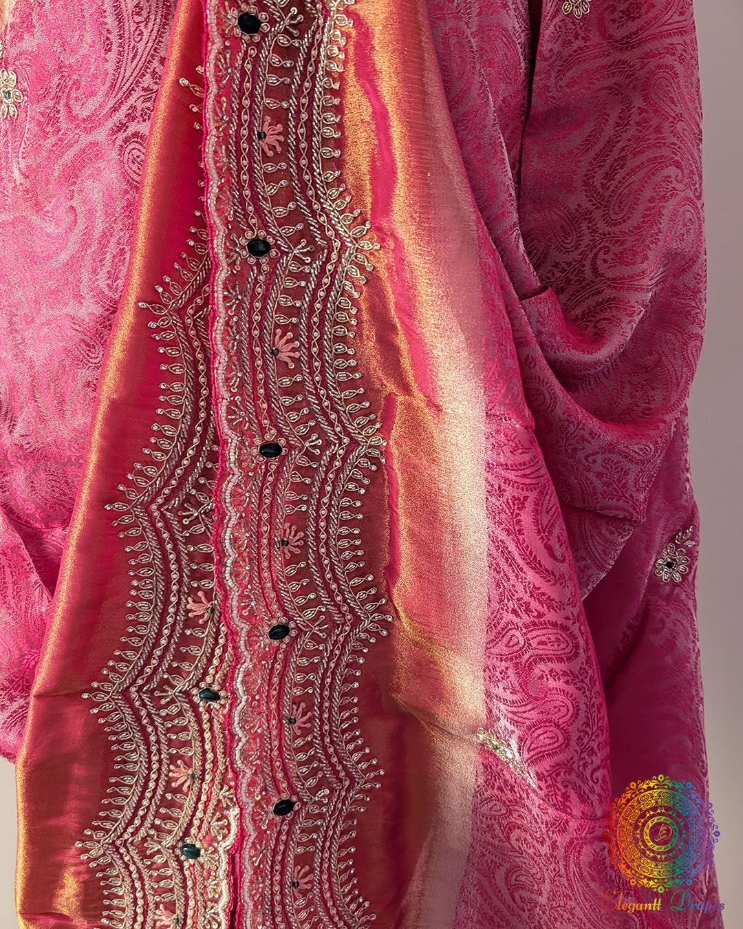 Close-up of intricate Cutdana, pearl, and zardozi hand embroidery on the Soft Tissue Silk saree