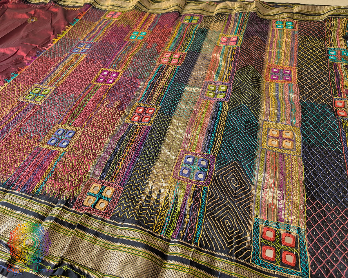 Maroon silk saree full layout view highlighting contrast black palla