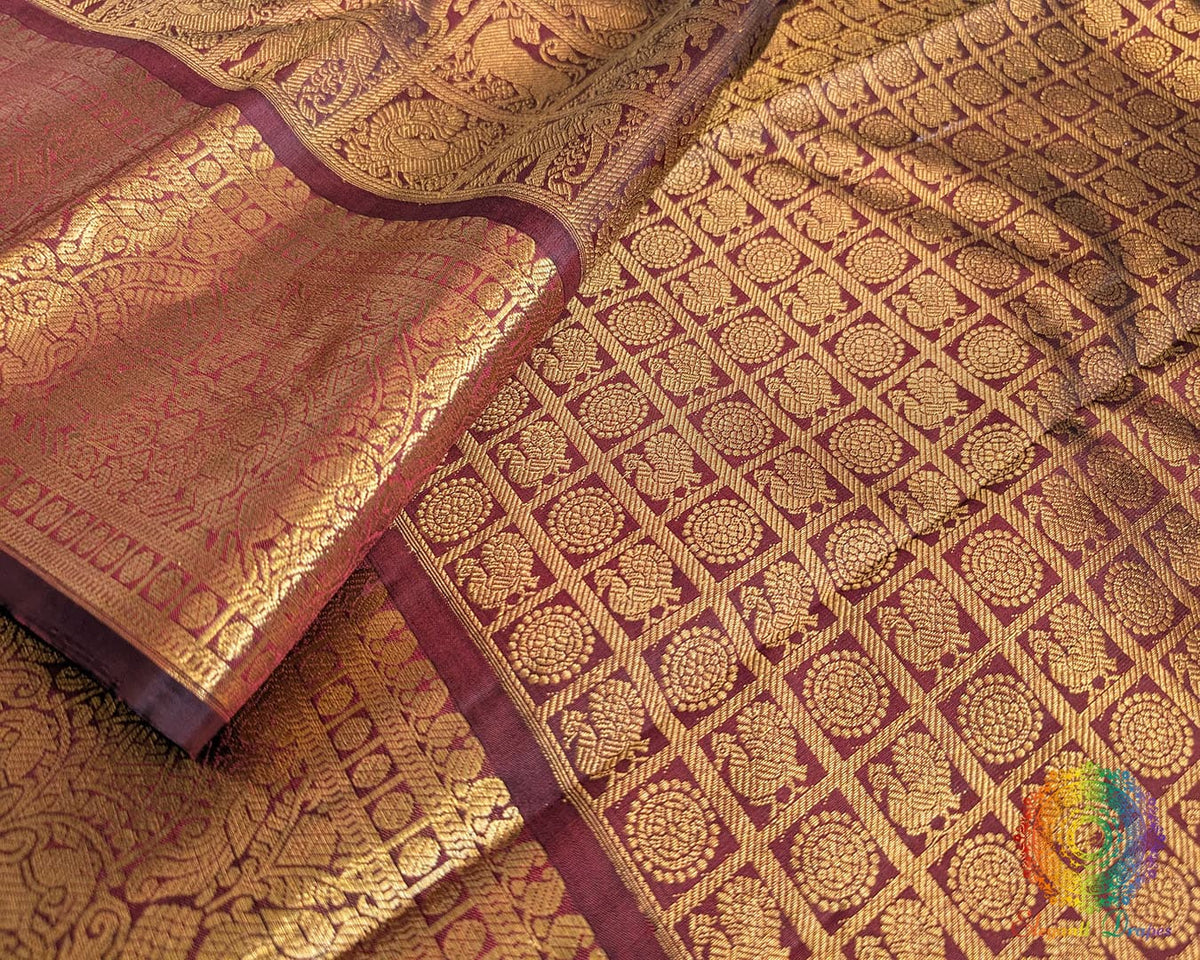 Maroon handwoven Kanjivaram silk saree zari border detail