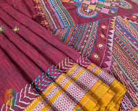Maroon Ilkal cotton saree with Lambani handwork embroidery close up view