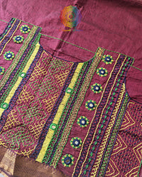 Close-up of Lambani hand embroidery on the back of Maroon Mangalgiri Cotton Blouse Piece