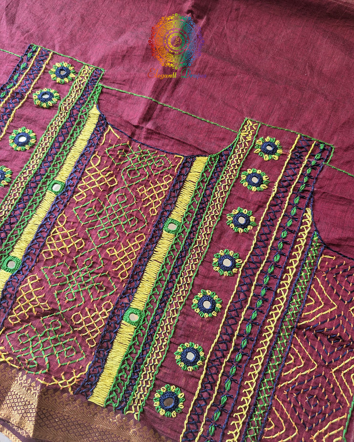 Close-up of Lambani hand embroidery on the back of Maroon Mangalgiri Cotton Blouse Piece